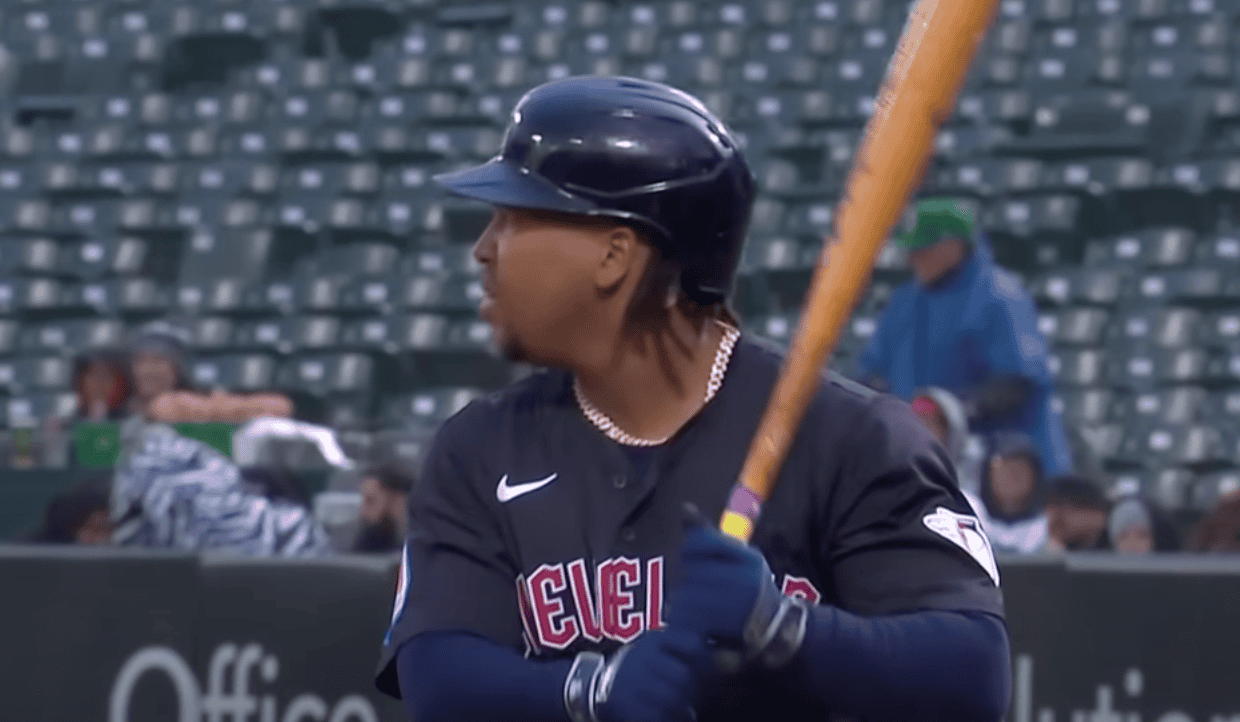 José Ramírez in action, showcasing his skills as a switch-hitter for the Cleveland Guardians.